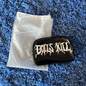 NWOT Dolls Kill cosmetic bag with dust bag